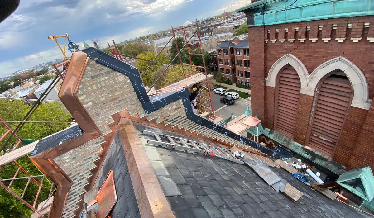 Roof replacement in progress — tear-off and scope are major cost factors