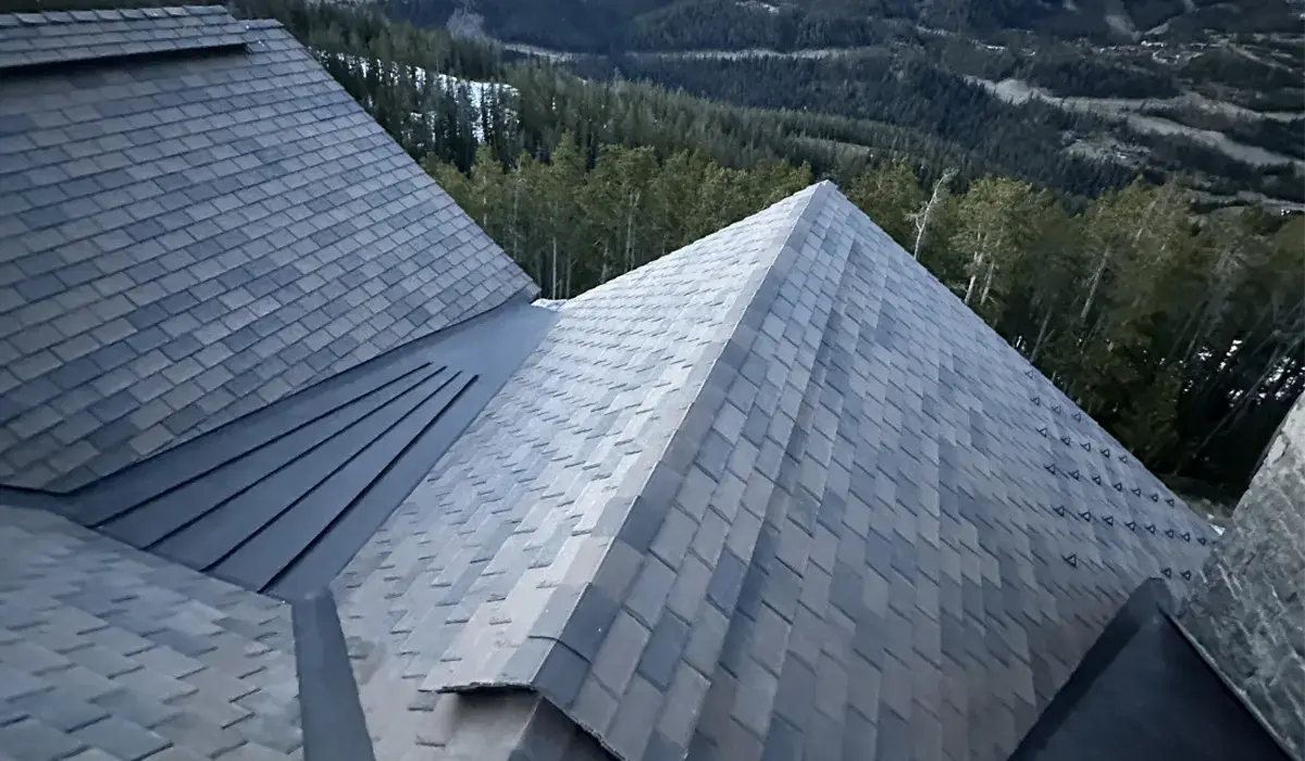Impact-rated architectural shingles laid over hips and valleys